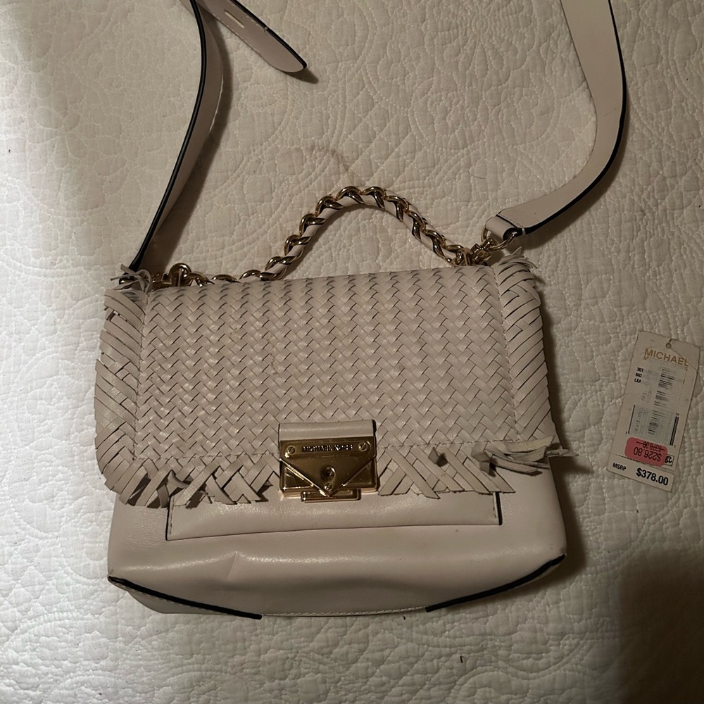 Woman’s MK purse